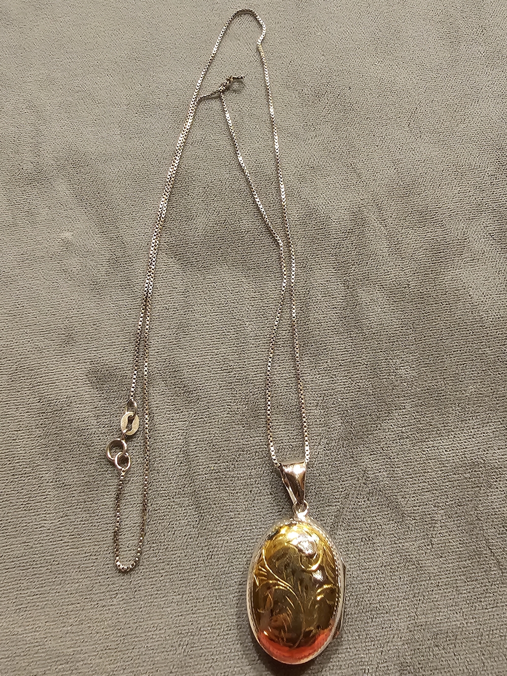 Two-Tone Engraved Oval Locket Necklace in Gold Plate and Stamped Silver